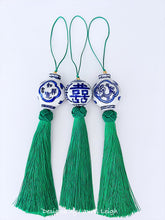 Load image into Gallery viewer, Three green decorative tassels with Chinoiserie porcelain bead accents