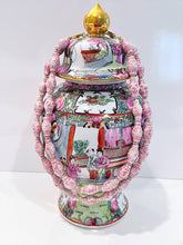Load image into Gallery viewer, A pink Chinoiserie double strand necklace made of ginger jar shaped porcelain beads is draped over a Rose Medallion vase