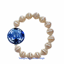 Load image into Gallery viewer, Gold Filigree Chinoiserie Focal Bead Bracelet