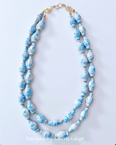 A blue Chinoiserie double strand necklace made of ginger jar shaped porcelain beads