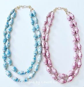 Two Chinoiserie double strand necklaces made of ginger jar shaped porcelain beads