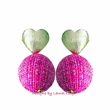 Load image into Gallery viewer, A pair of pink raffia ball earrings with gold heart posts 