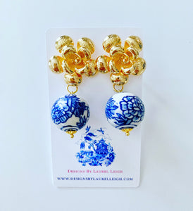 A pair of Blue and White Chinoiserie Peony Bead Earrings with gold floral posts